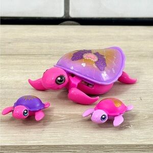 Little Live Pets Pink Turtle And 2 Babies Pink And Purple Swimming